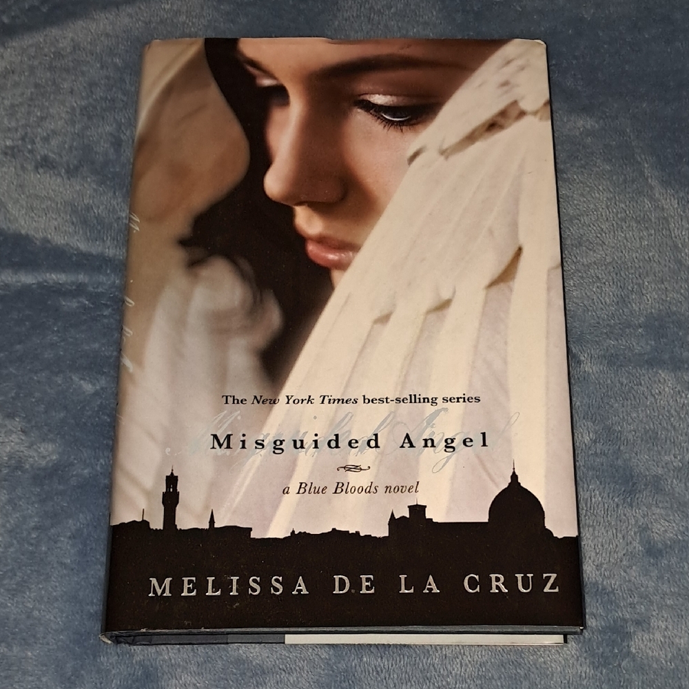 Misguided Angel by Melissa de la Cruz - Black and White Hard Cover Book